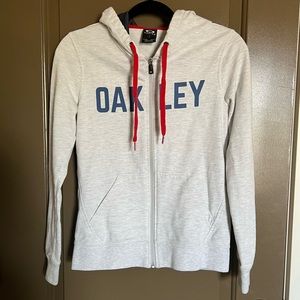 Oakley zip up sweater.